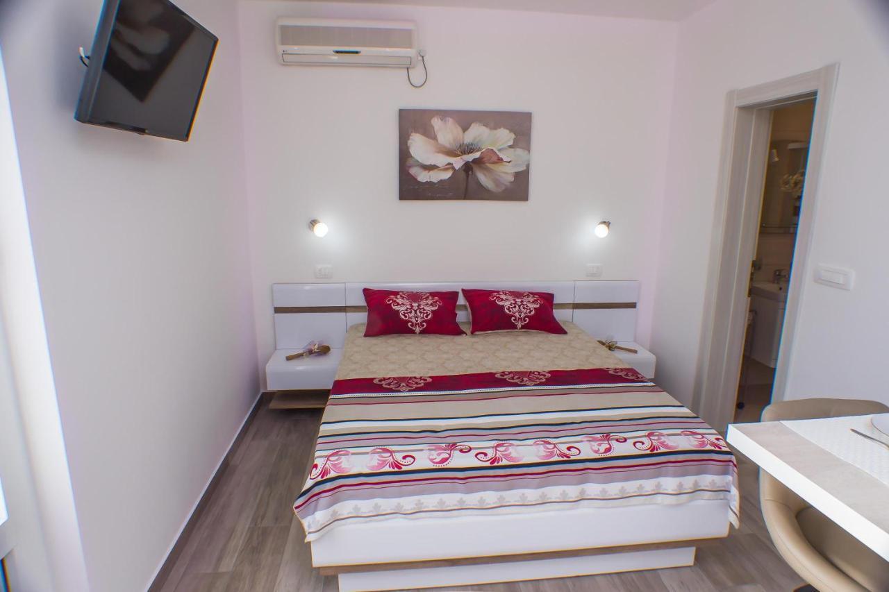 Dmm Apartments ติวัต ภายนอก รูปภาพ