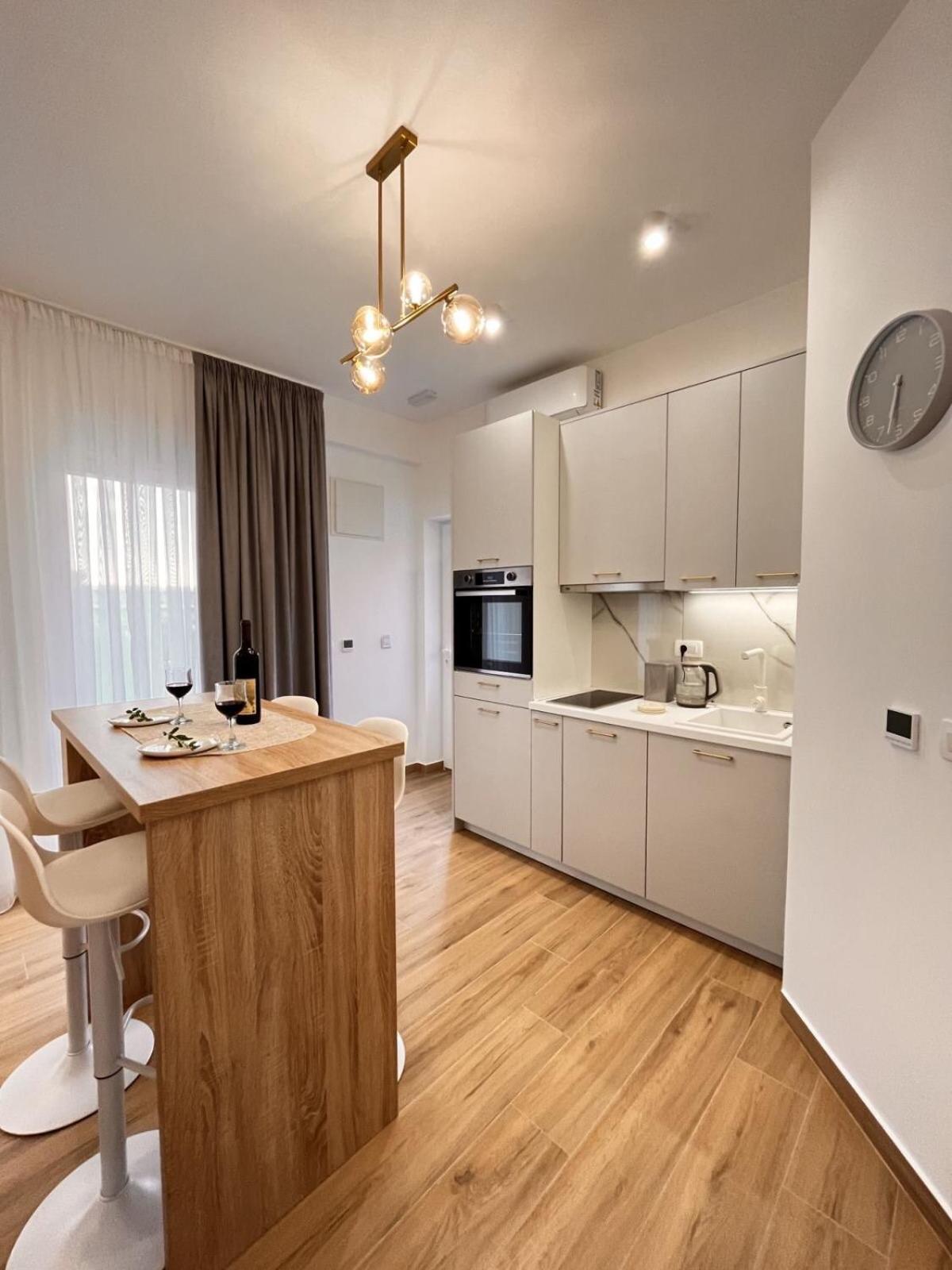 Dmm Apartments ติวัต ภายนอก รูปภาพ
