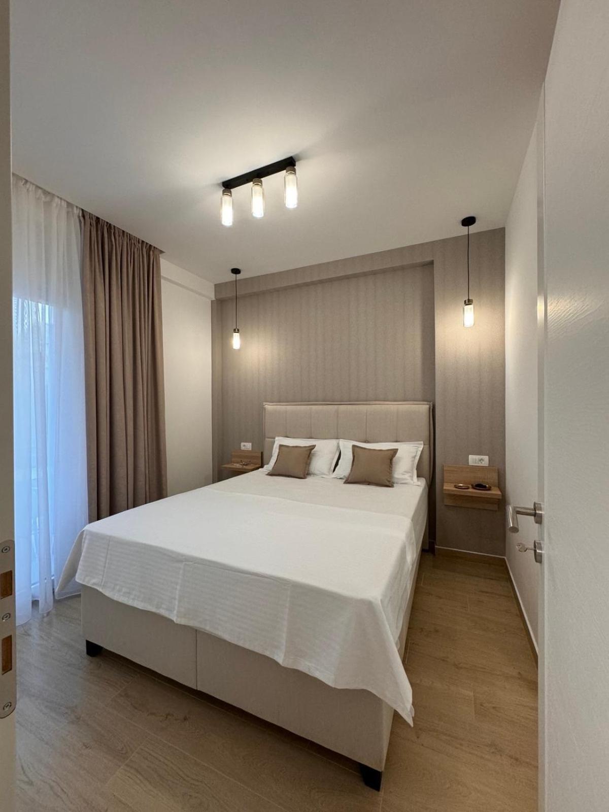 Dmm Apartments ติวัต ภายนอก รูปภาพ